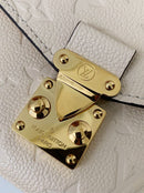 Pochette Métis East West Monogram Empreinte Cream