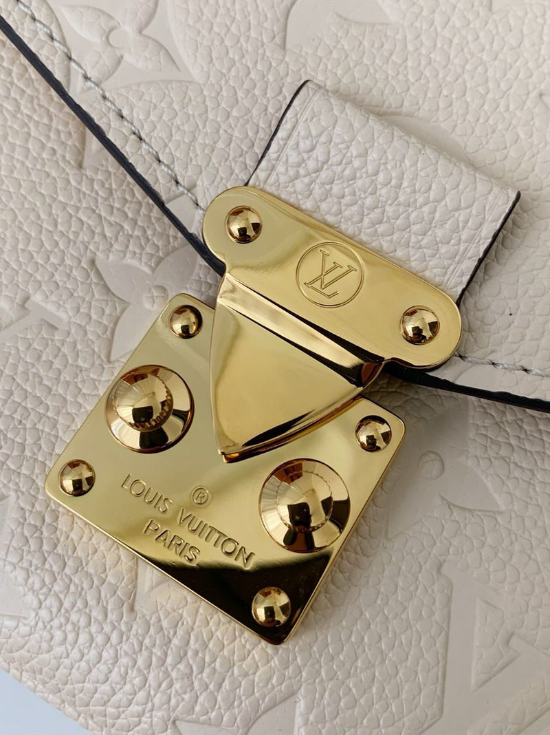 Pochette Métis East West Monogram Empreinte Cream