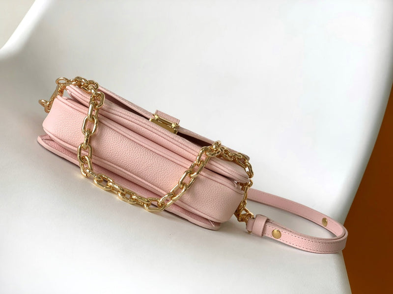 Pochette Métis East West Monogram Empreinte Pink Opale