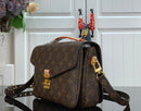 Pochette Métis East West Monogram Canvas Brown