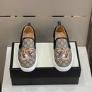 GUCCI GG Supreme Tiger Slip On