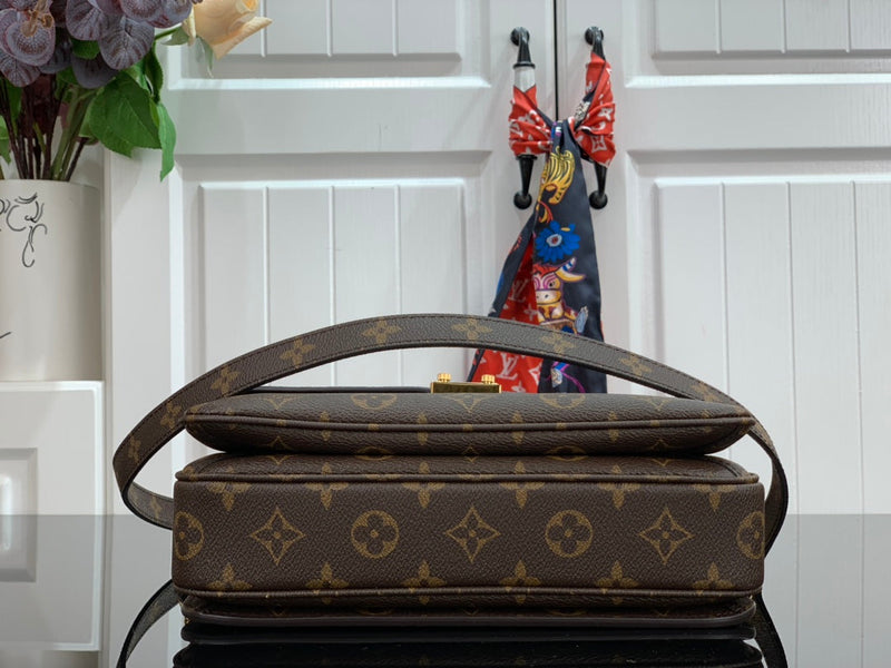 Pochette Métis East West Monogram Canvas Brown