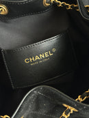 Bolsa Hobo  Chanel 25 em camurça Black